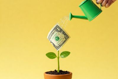A small plant sprouting from a pot with a one dollar bill as its leaf, being watered to symbolize financial growth through nurturing